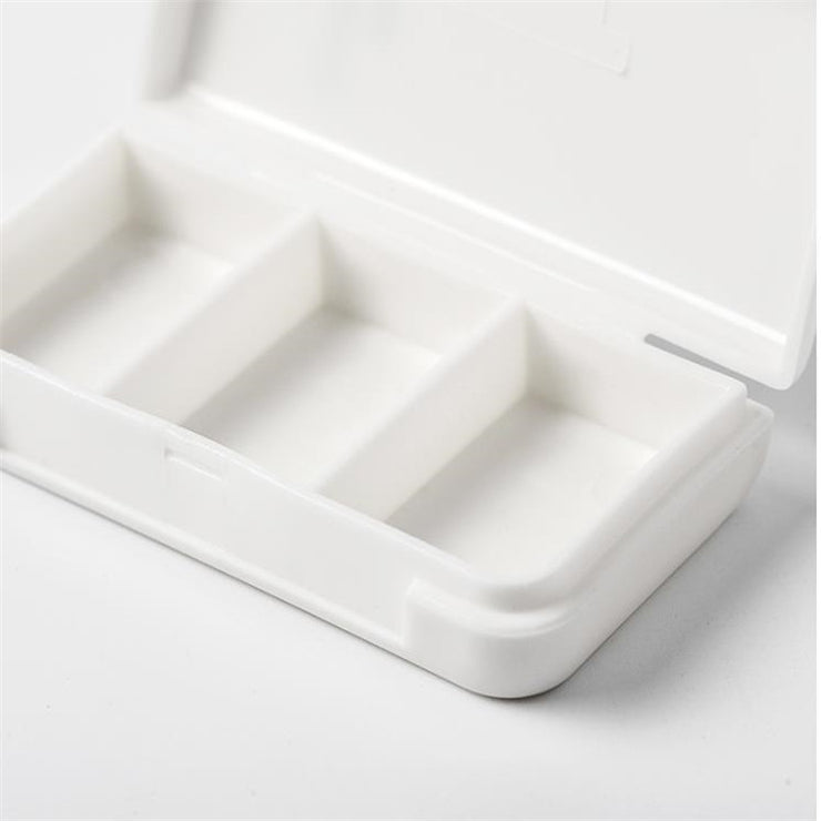 Portable pill storage box